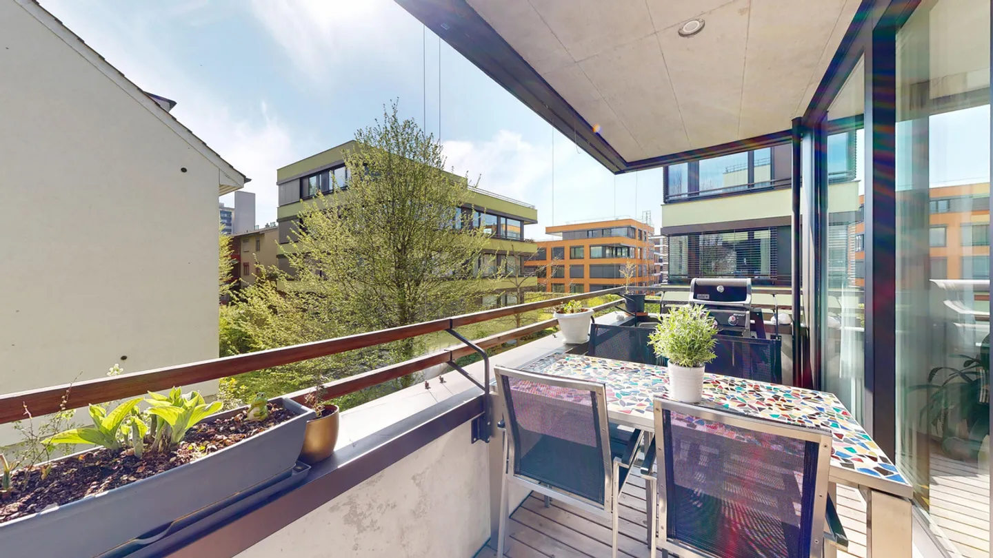 Modern 3.5-room apartment in building rights with parking space - Photo 2 of 15