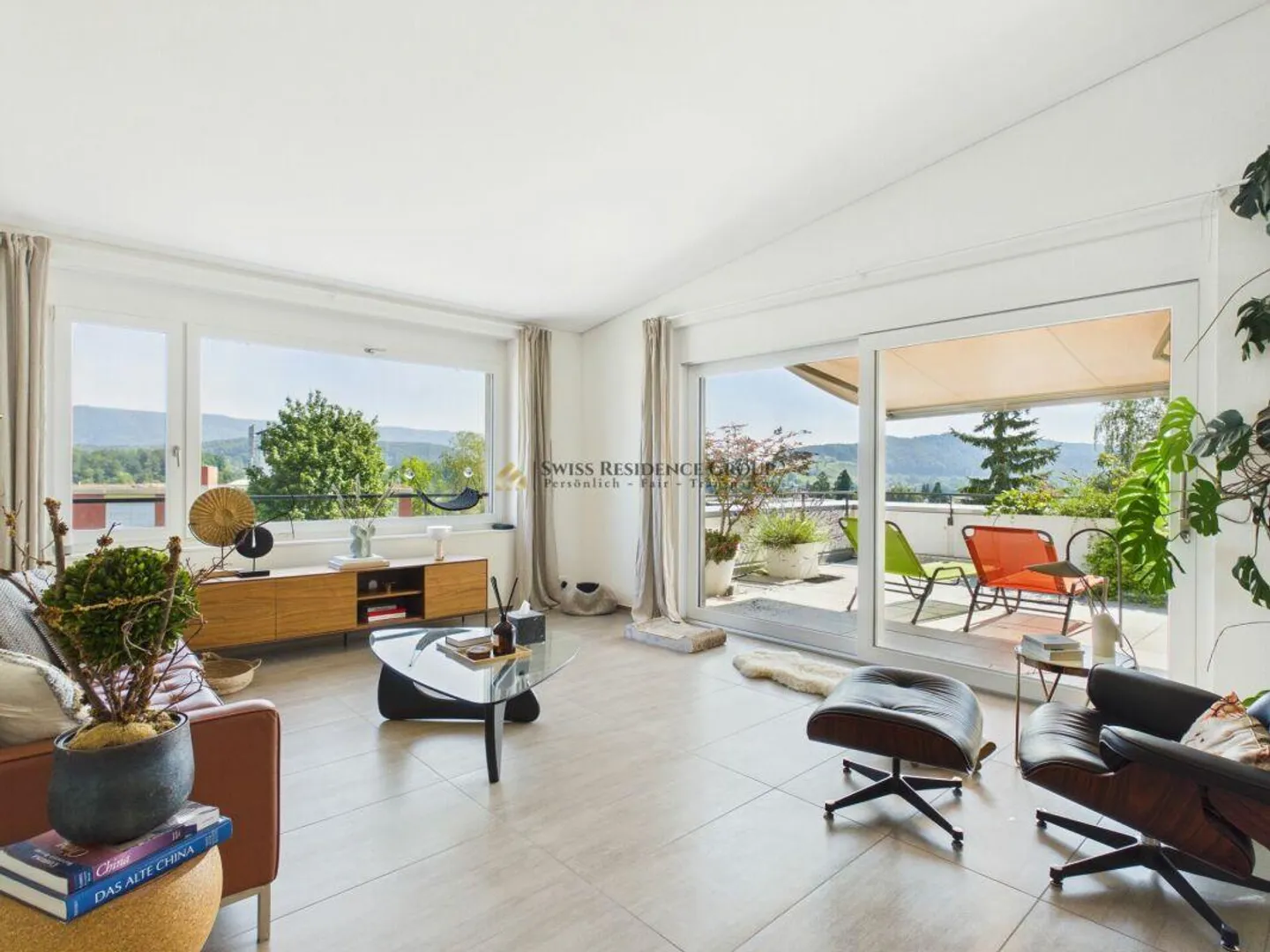 Light-flooded living with large terrace and breathtaking views - Photo 2 of 13