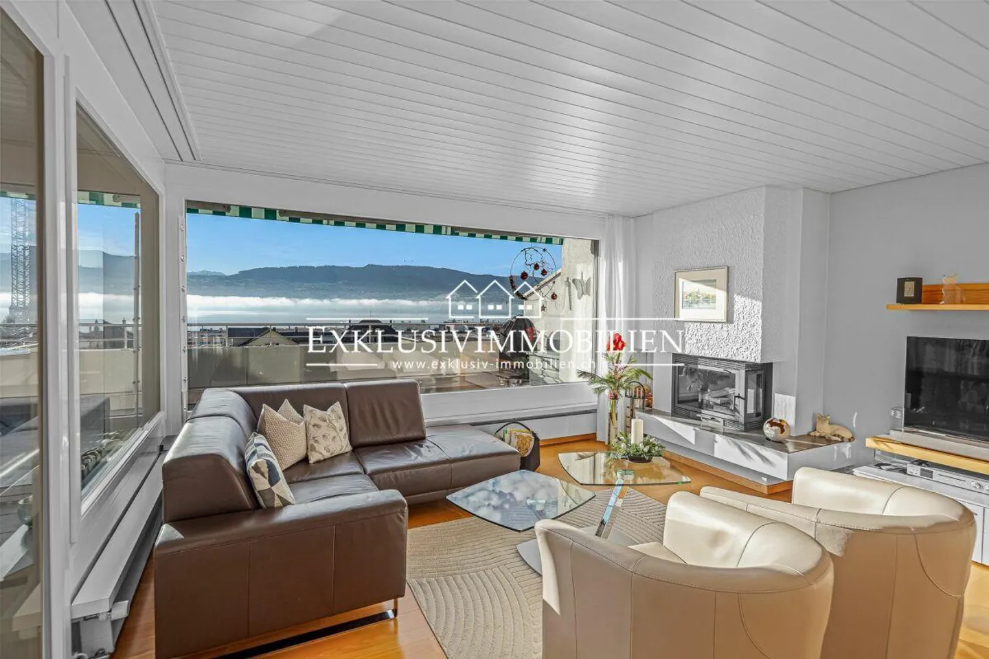 Appartamento attico su due livelli con giardino d'inverno, vista lago e montagna - Foto 1 di 6