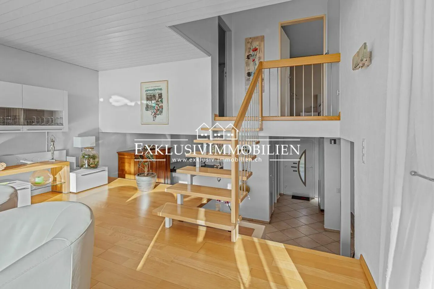 Appartamento attico su due livelli con giardino d'inverno, vista lago e montagna - Foto 3 di 6