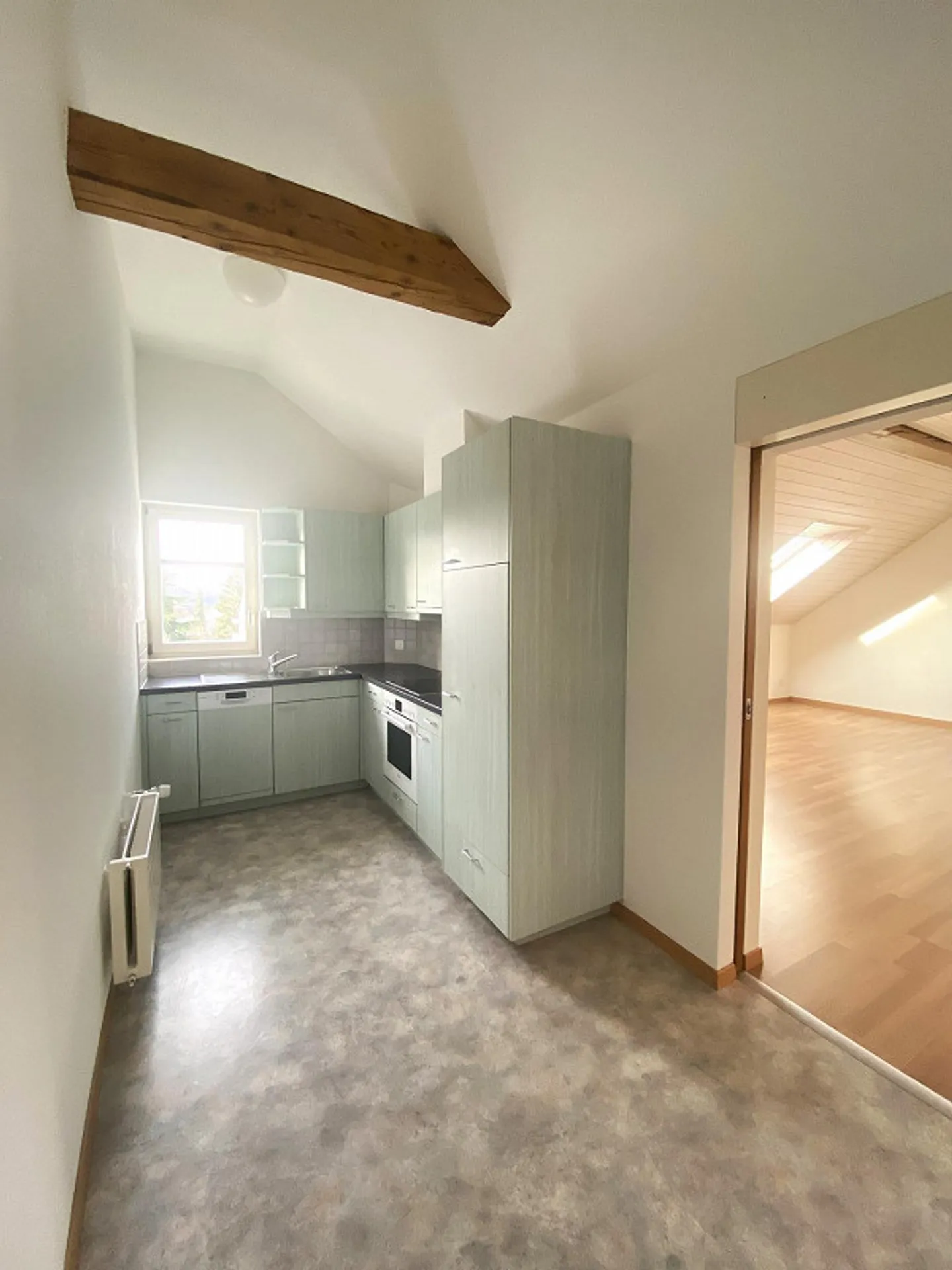 Grosszügige und helle Dachwohnung - Foto 3 von 5