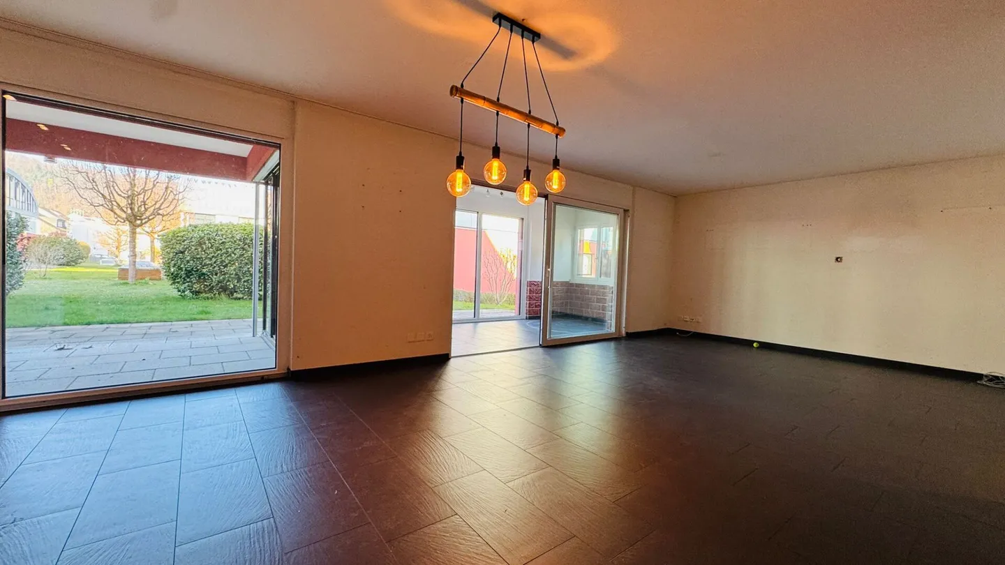 Modern 5.5-room garden maisonette apartment with winter garden, seating area and garage space - Photo 3 of 15