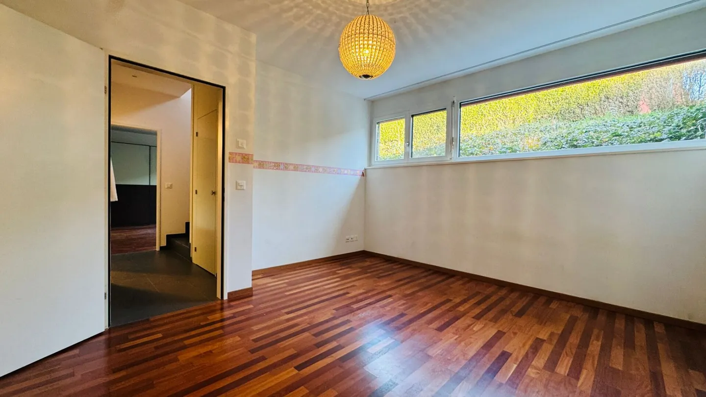 Modern 5.5-room garden maisonette apartment with winter garden, seating area and garage space - Photo 7 of 15