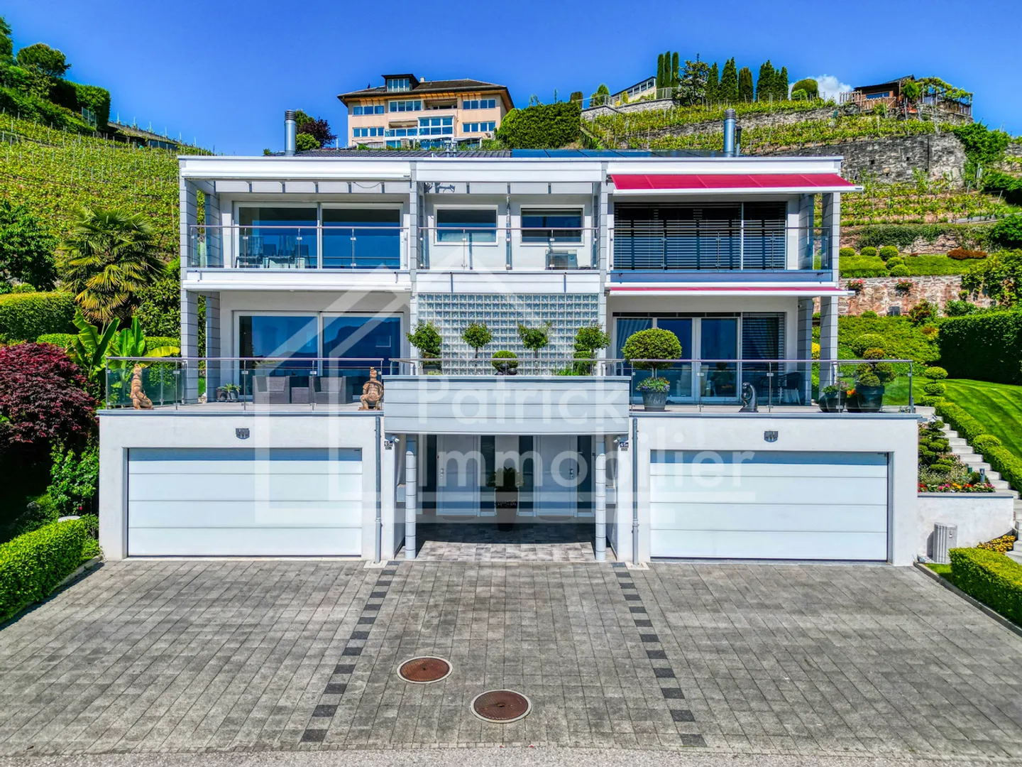 Villa bifamiliare 7.5 camere con vista lago sublime, luce e raffinatezza - Foto 1 di 13
