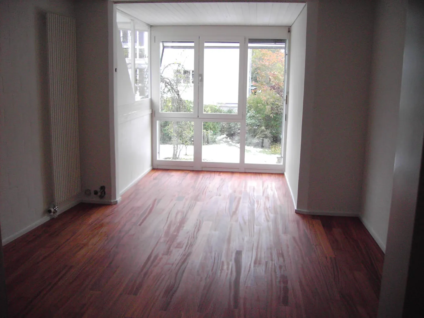 Appartement en duplex lumineux de 4,5 pièces au rez-de-jardin et au 1er étage avec véranda - Photo 8 sur 10