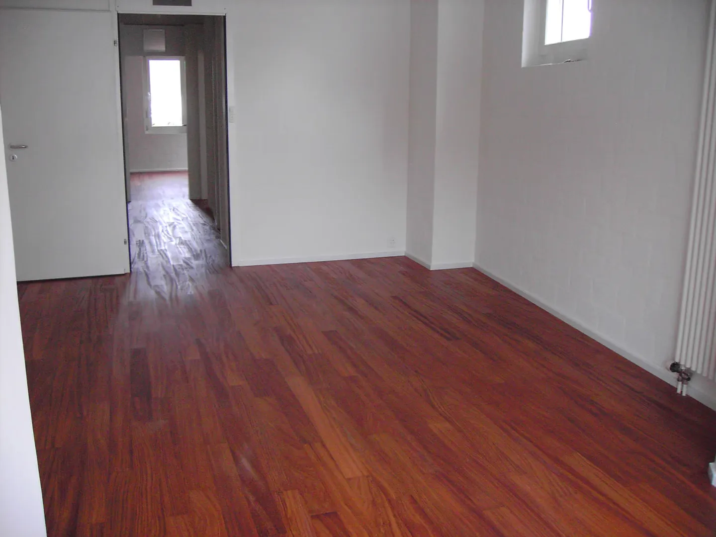 Appartement en duplex lumineux de 4,5 pièces au rez-de-jardin et au 1er étage avec véranda - Photo 9 sur 10