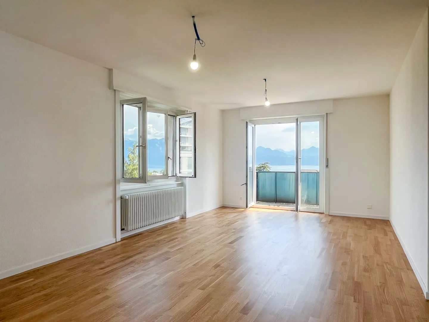 Appartement Charmant avec Vue sur le Lac - Photo 5 sur 8