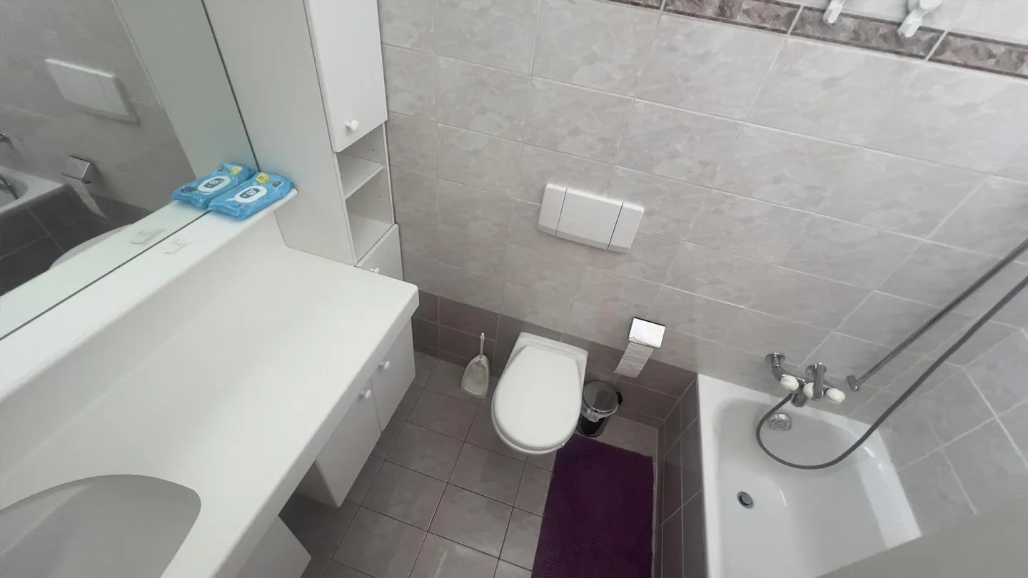 MAISON MITOYENNE DE TÊTE DE 4.5 PIÈCES SUR 4 NIVEAUX À AGNO - Photo 9 sur 13