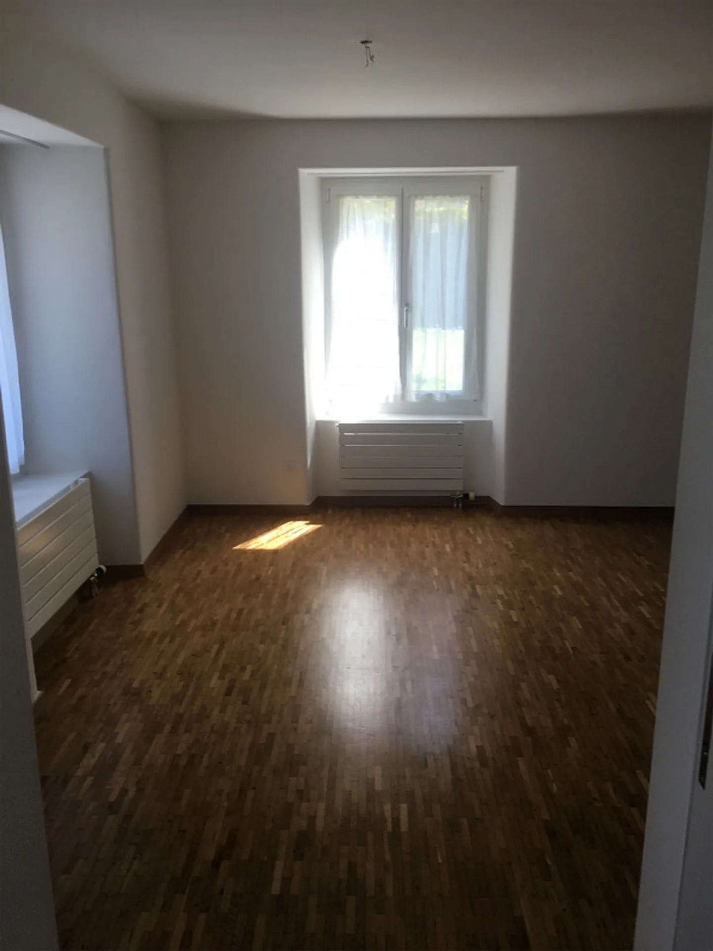 Bright 2.5 room apartment on the raised ground floor - Photo 3 of 12