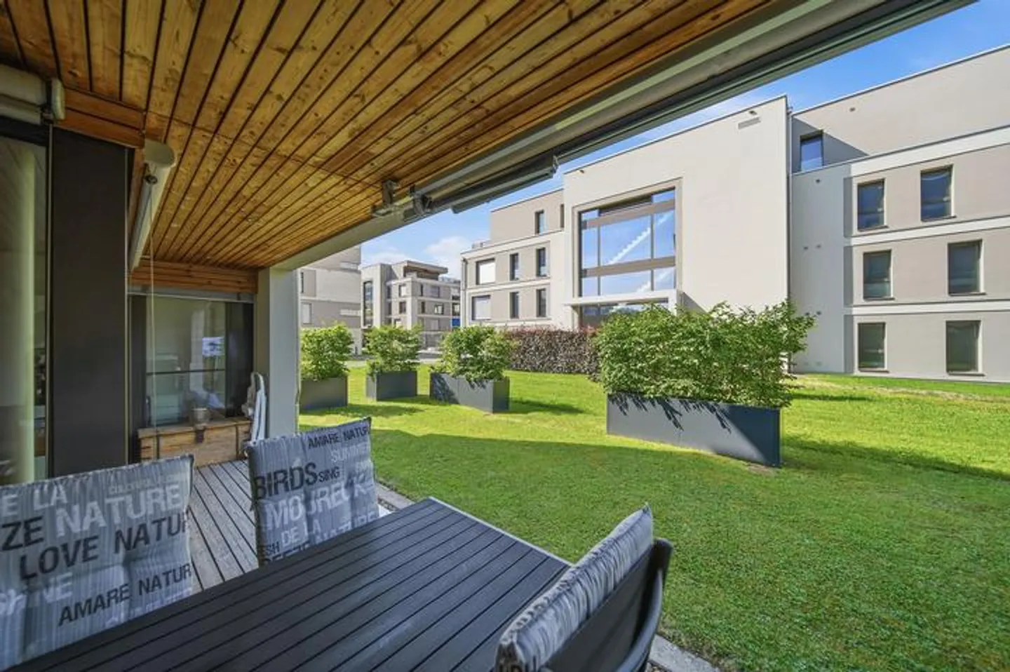 APPARTAMENTO CON GIARDINO DI 2.5 LOCALI SU 85 M² - ARCHITETTURA ULTRA MODERNA - Foto 7 di 8