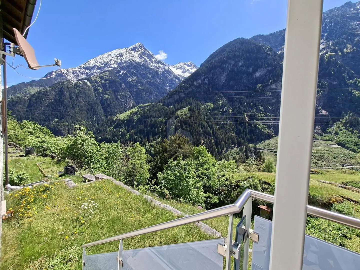 LIGHT-FILLED, FRIENDLY WITH MOUNTAIN PANORAMA - Photo 1 of 6
