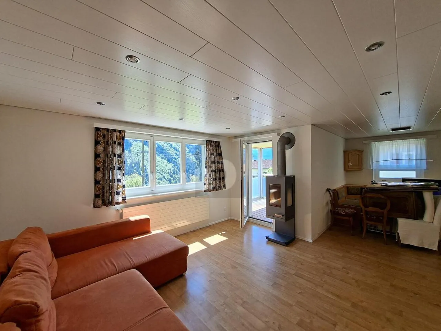 LIGHT-FILLED, FRIENDLY WITH MOUNTAIN PANORAMA - Photo 2 of 6