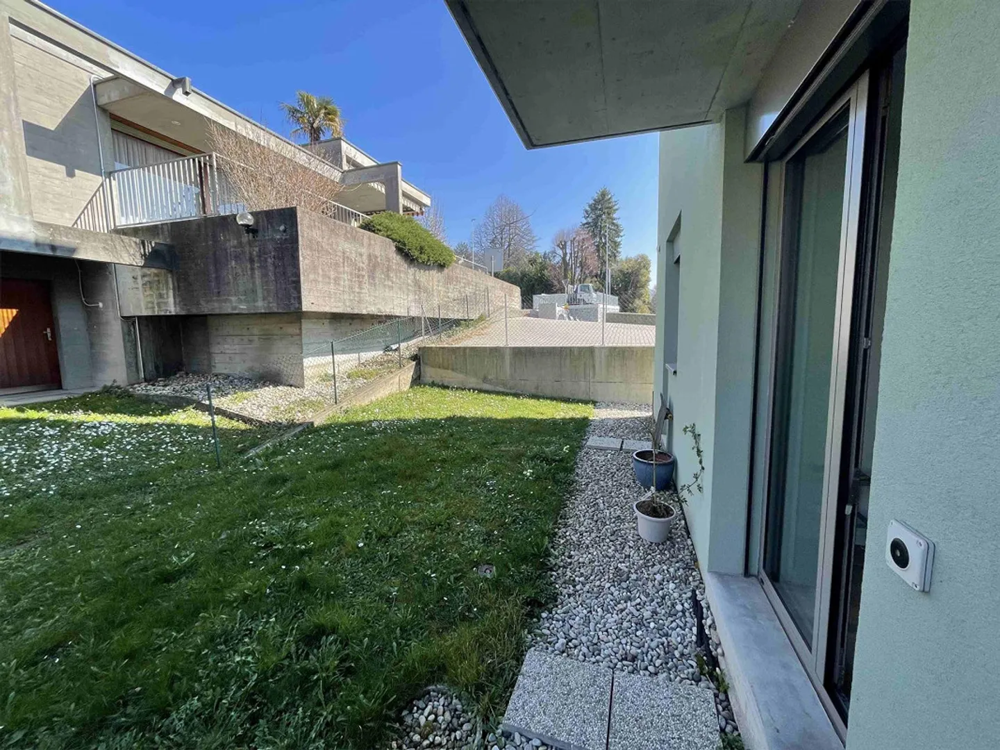 Appartement intéressant 3,5 pièces avec jardin et deux places de parking - Photo 10 sur 11