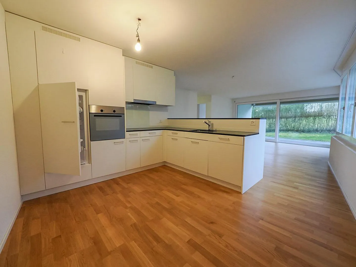Modernes Erdgeschoss-Apartment - Foto 1 von 8
