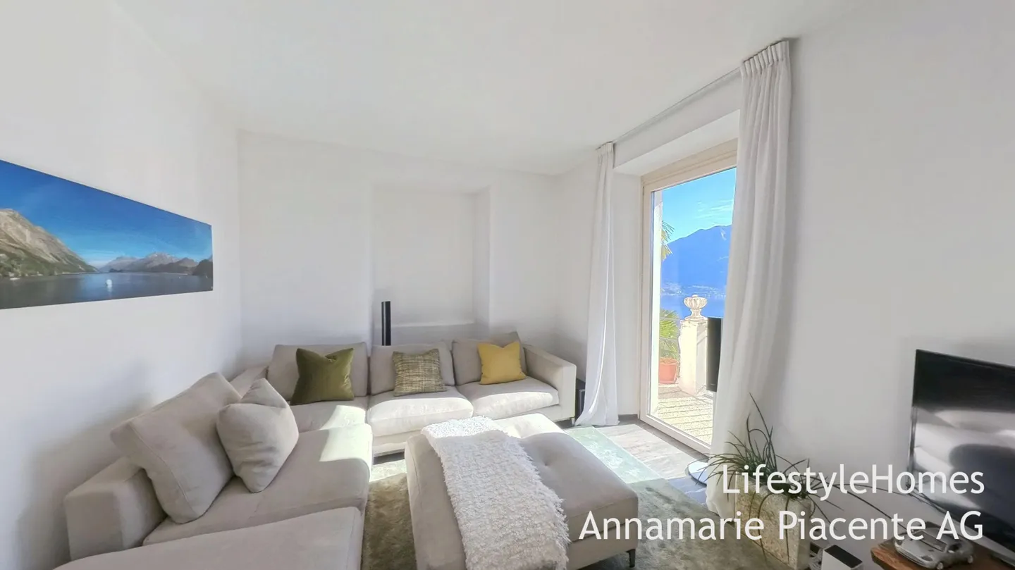 MAISON MULTIFAMILIALE AVEC VUE SUR LE LAC - Photo 2 sur 15