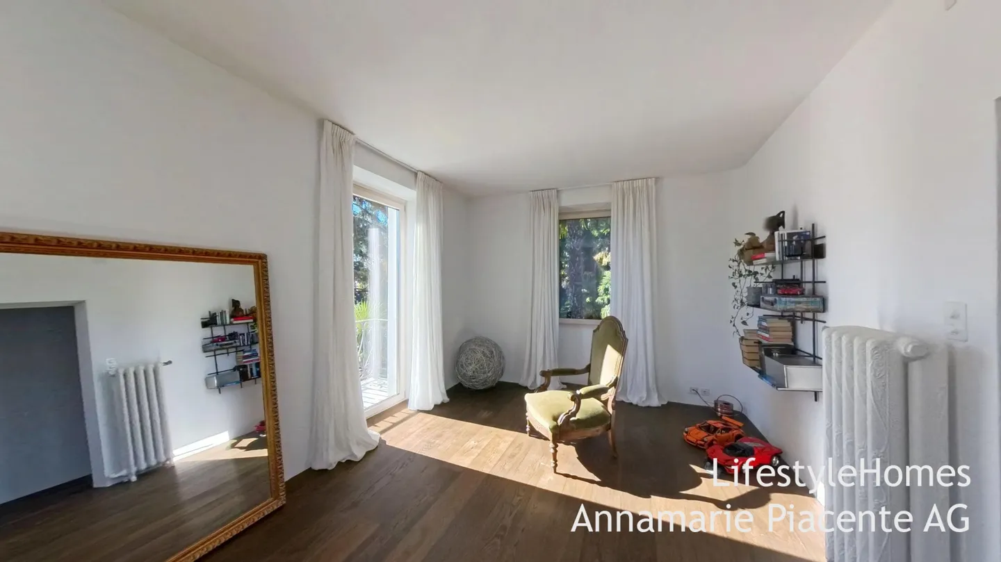 MAISON MULTIFAMILIALE AVEC VUE SUR LE LAC - Photo 3 sur 15