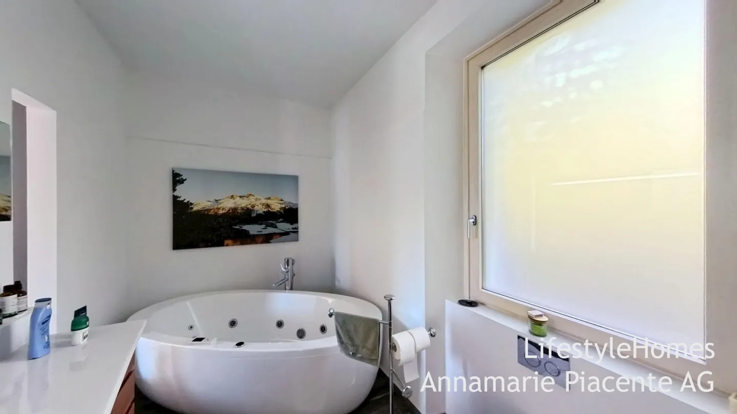 MAISON MULTIFAMILIALE AVEC VUE SUR LE LAC - Photo 8 sur 15