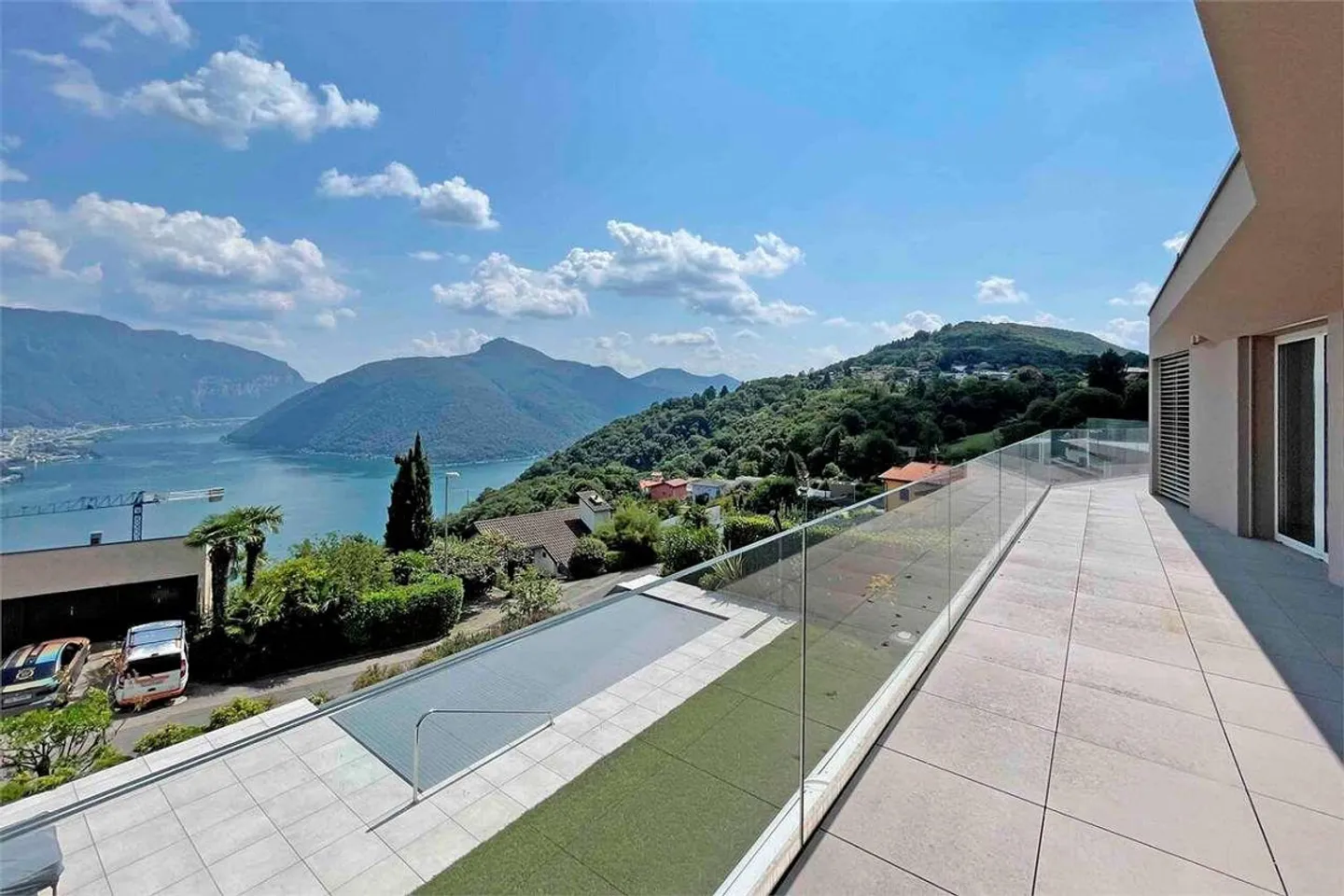 Attico dominante con vista lago a Carona - Foto 1 di 13