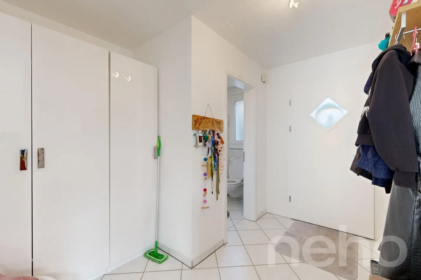 Maison de ville d'angle bien entretenue avec jardin, garage et confort moderne - Photo 12 sur 12