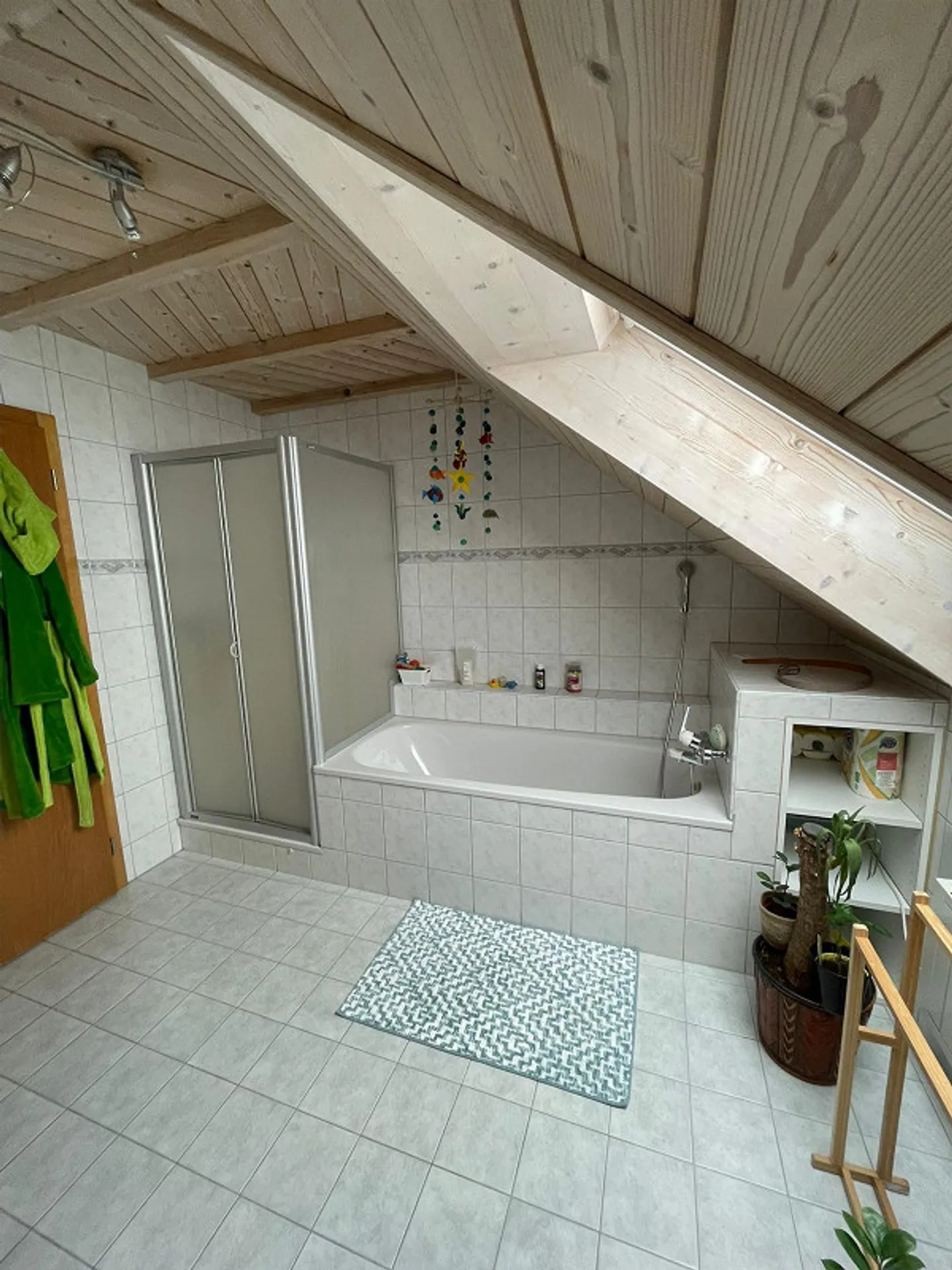 Charming 2.5-room attic apartment in a quiet location of Lieli LU - Photo 7 of 7