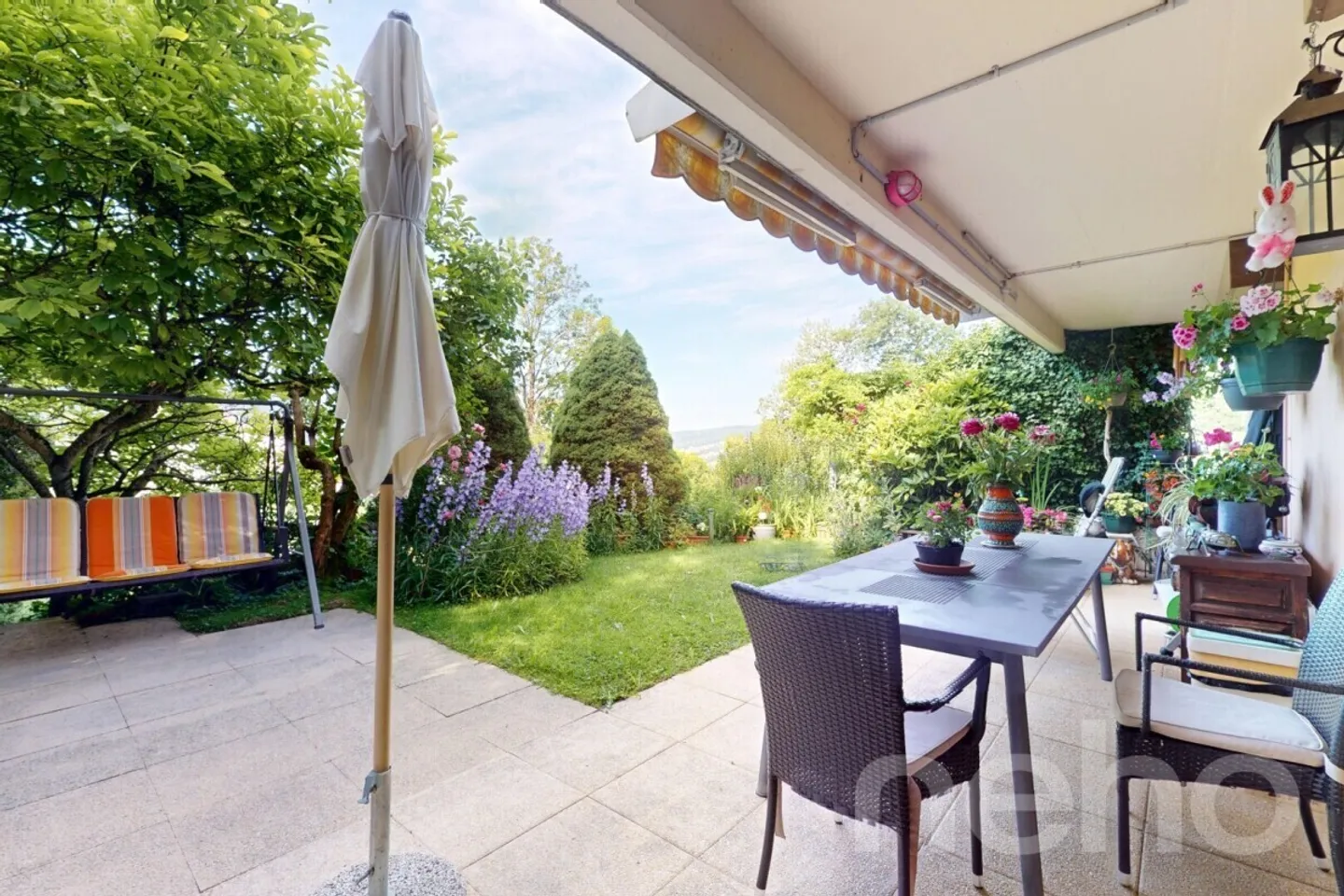 4,5-Zimmer-Wohnung mit Garten, Bergblick und Garage - Foto 2 von 12