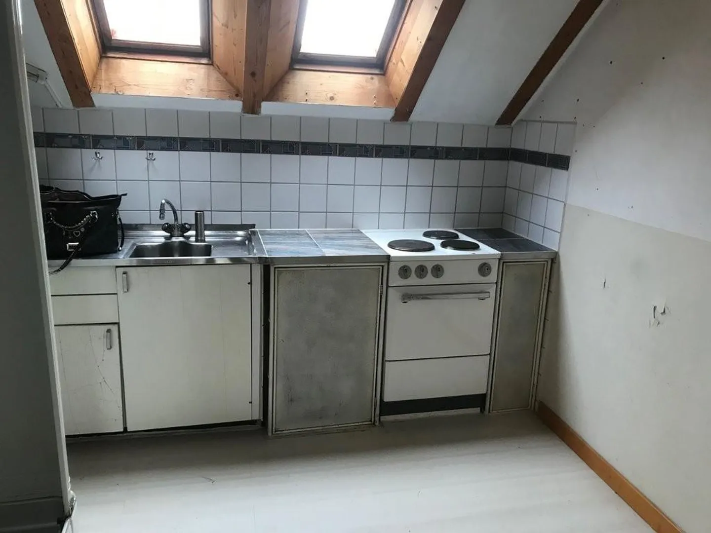Charming Attic Apartment in Retro Style - Photo 2 of 7