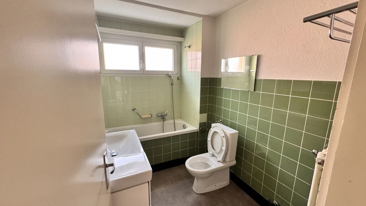 Appartement en attique de 5,5 pièces au centre dans le quartier de Maihof - Photo 12 sur 15