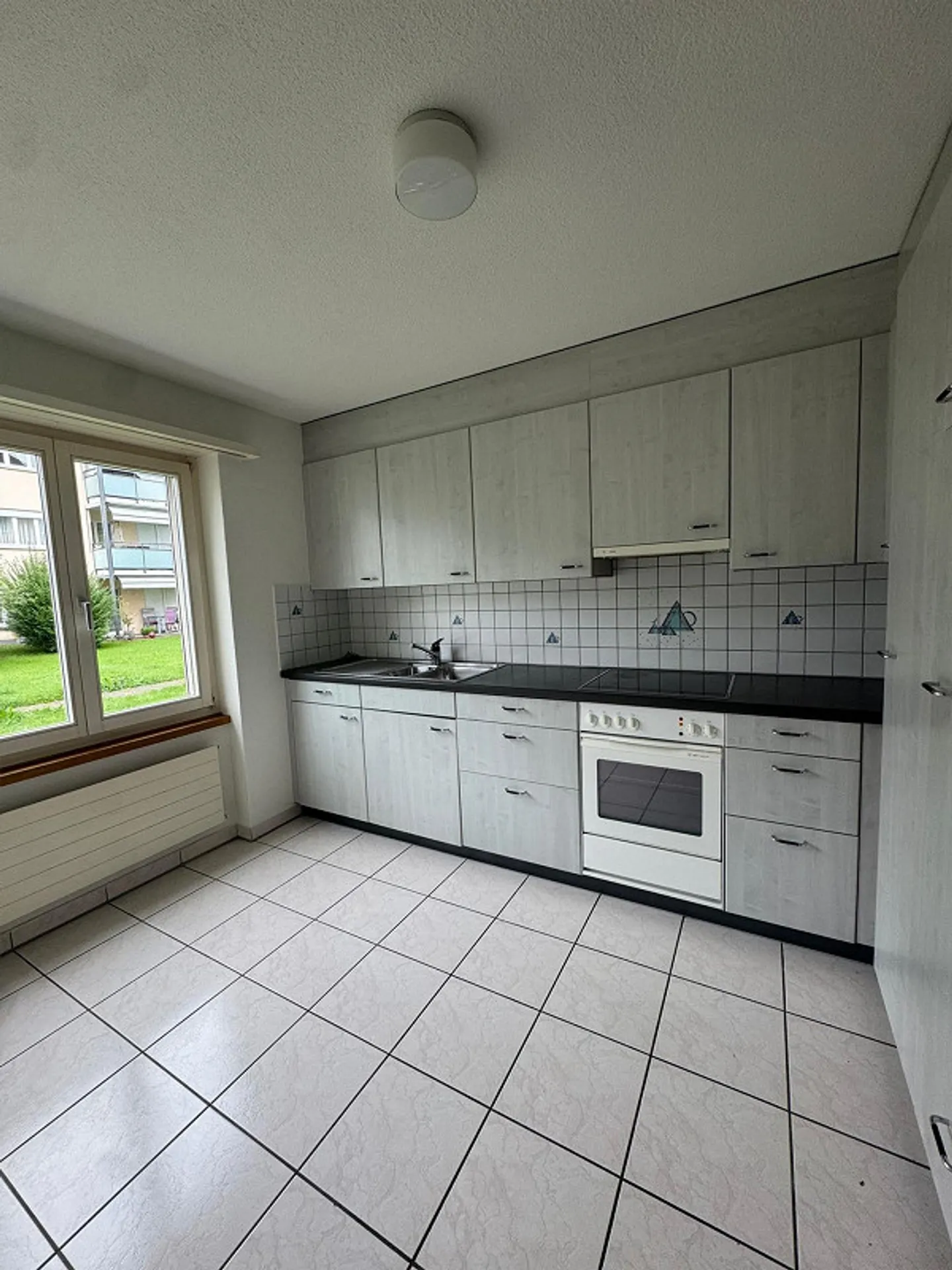 Cozy 3.5-room apartment with garden seating area in Malters - Photo 2 of 7