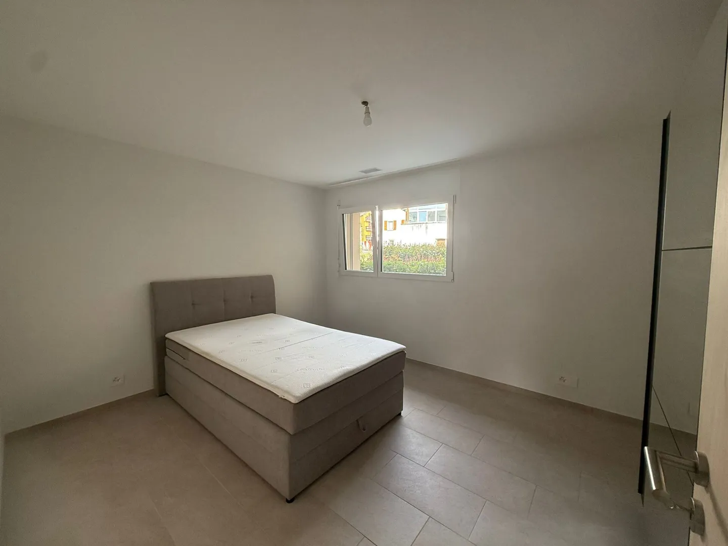 Appartamento 2.5 locali con giardino - Foto 5 di 8