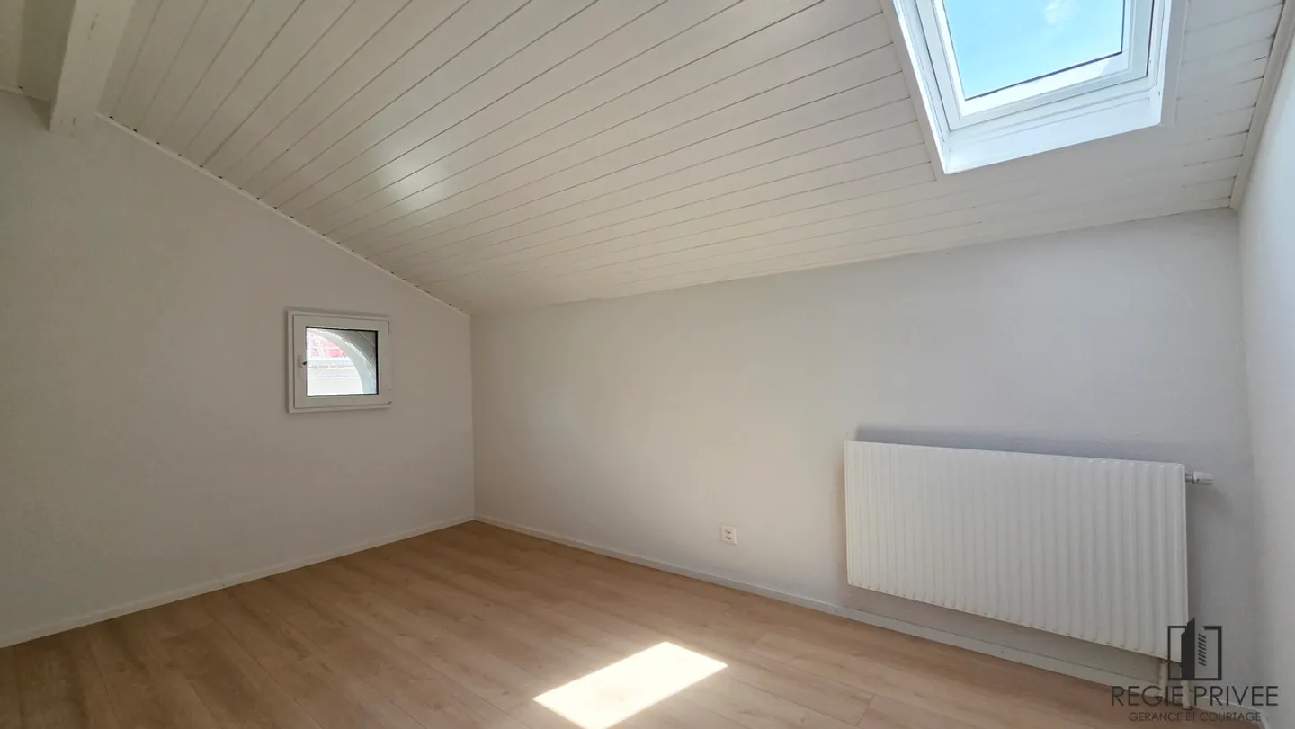 Dachgeschosswohnung mit Garten - Foto 5 von 10