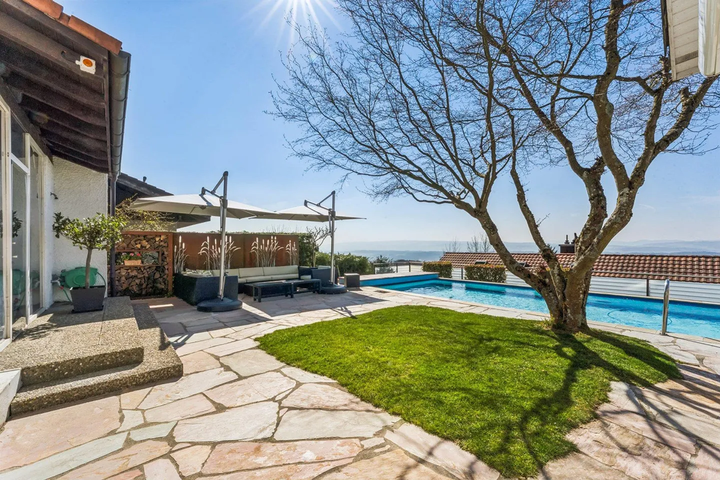 Stylish family home with garden, view and pool - Photo 1 of 4
