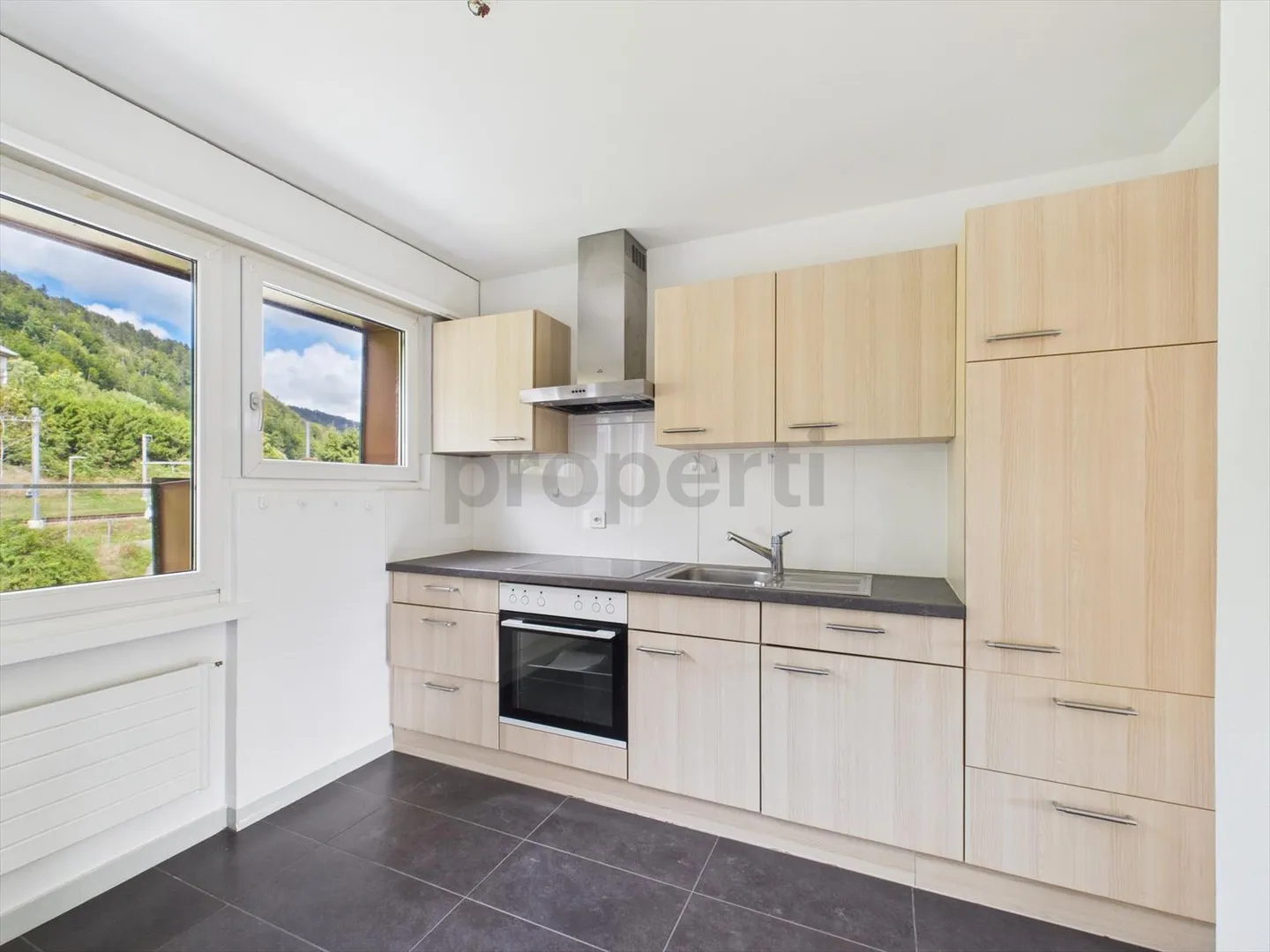 Appartement exclusif à Renan, BE - Un foyer harmonieux dans un cadre rural - Photo 2 sur 7