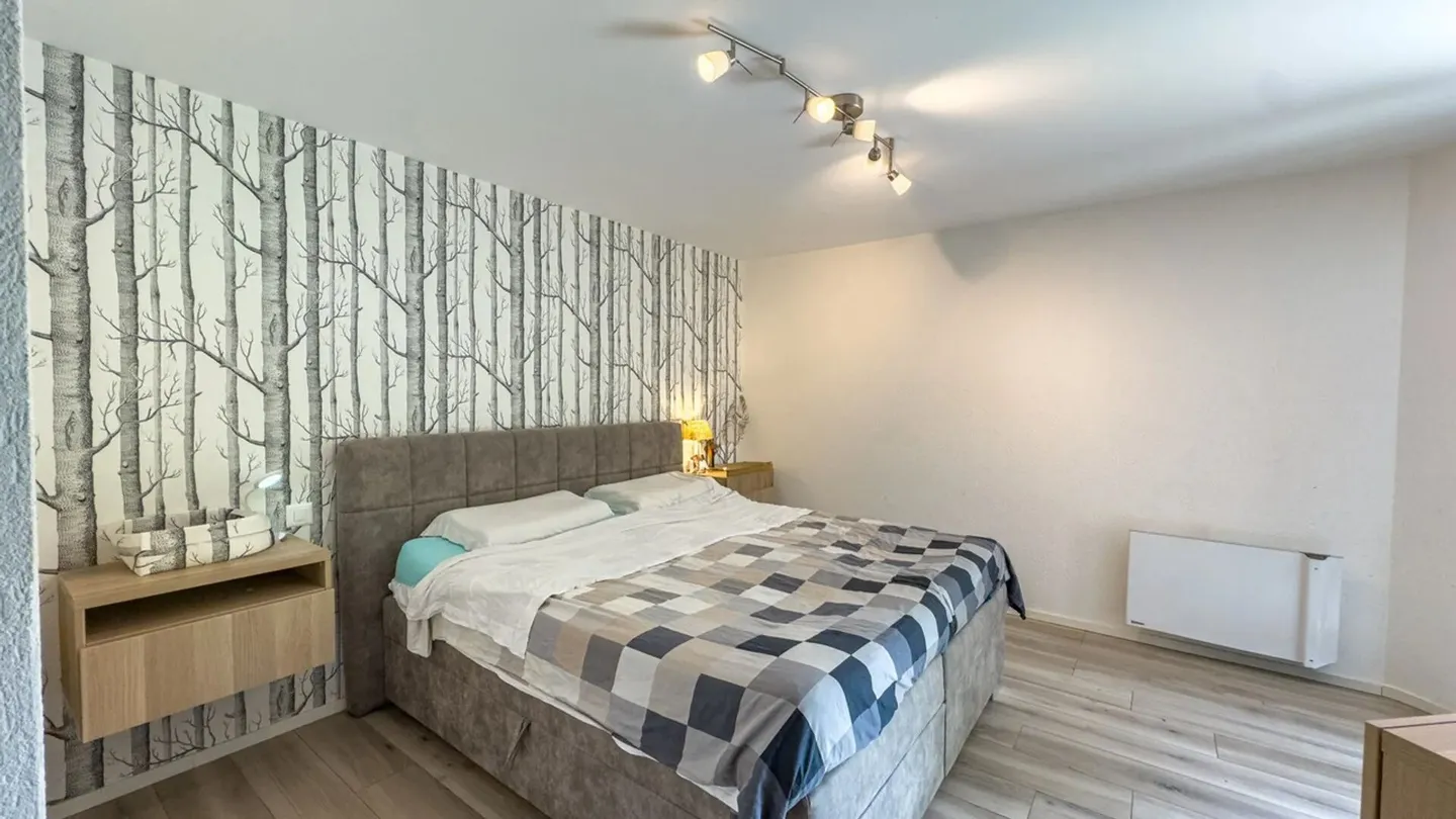 Elegantes Haus am See in Bissone - Foto 10 von 11