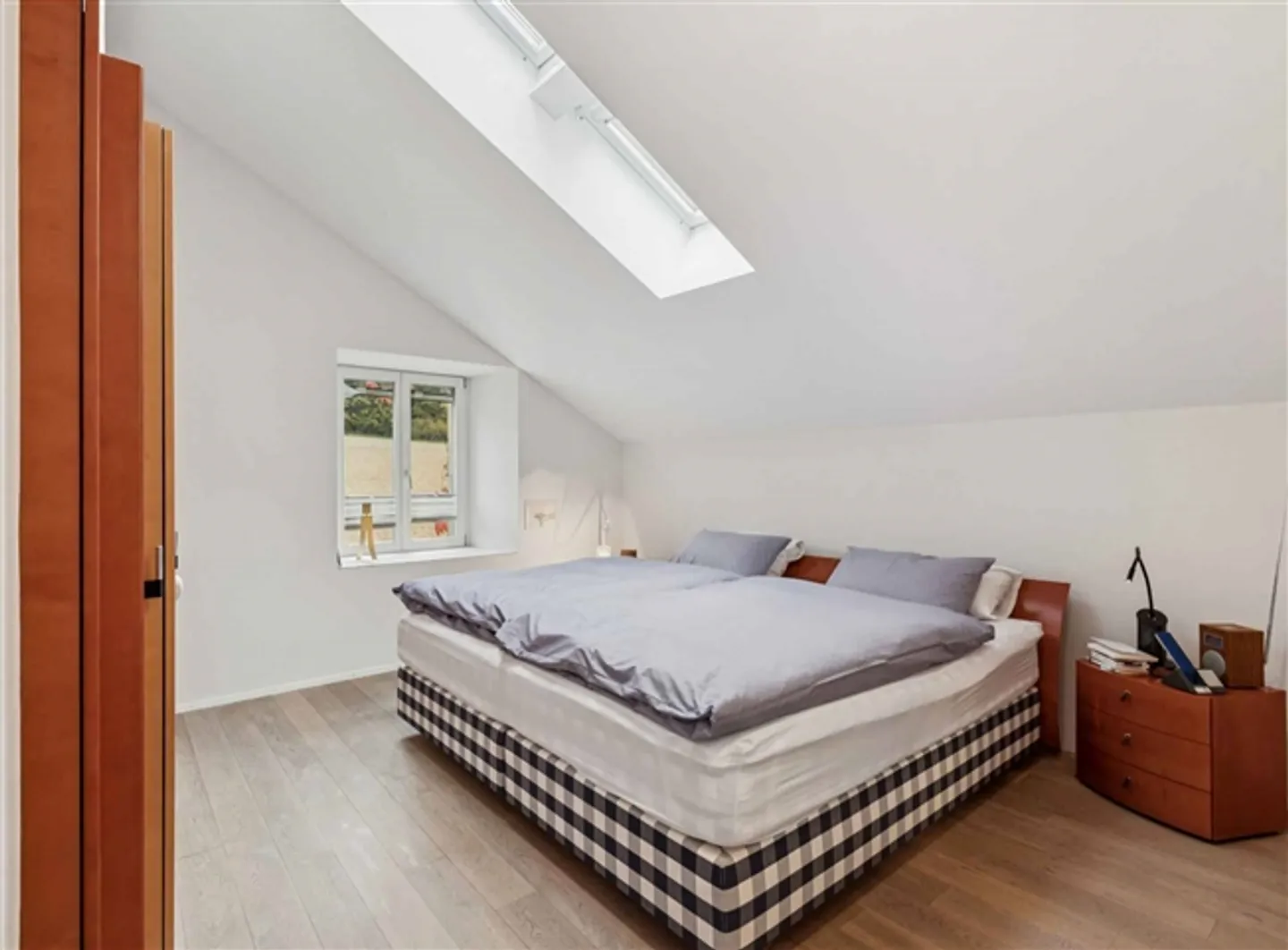 An extraordinary farmhouse nestled at the southern foot of Chasseral - Photo 7 of 13