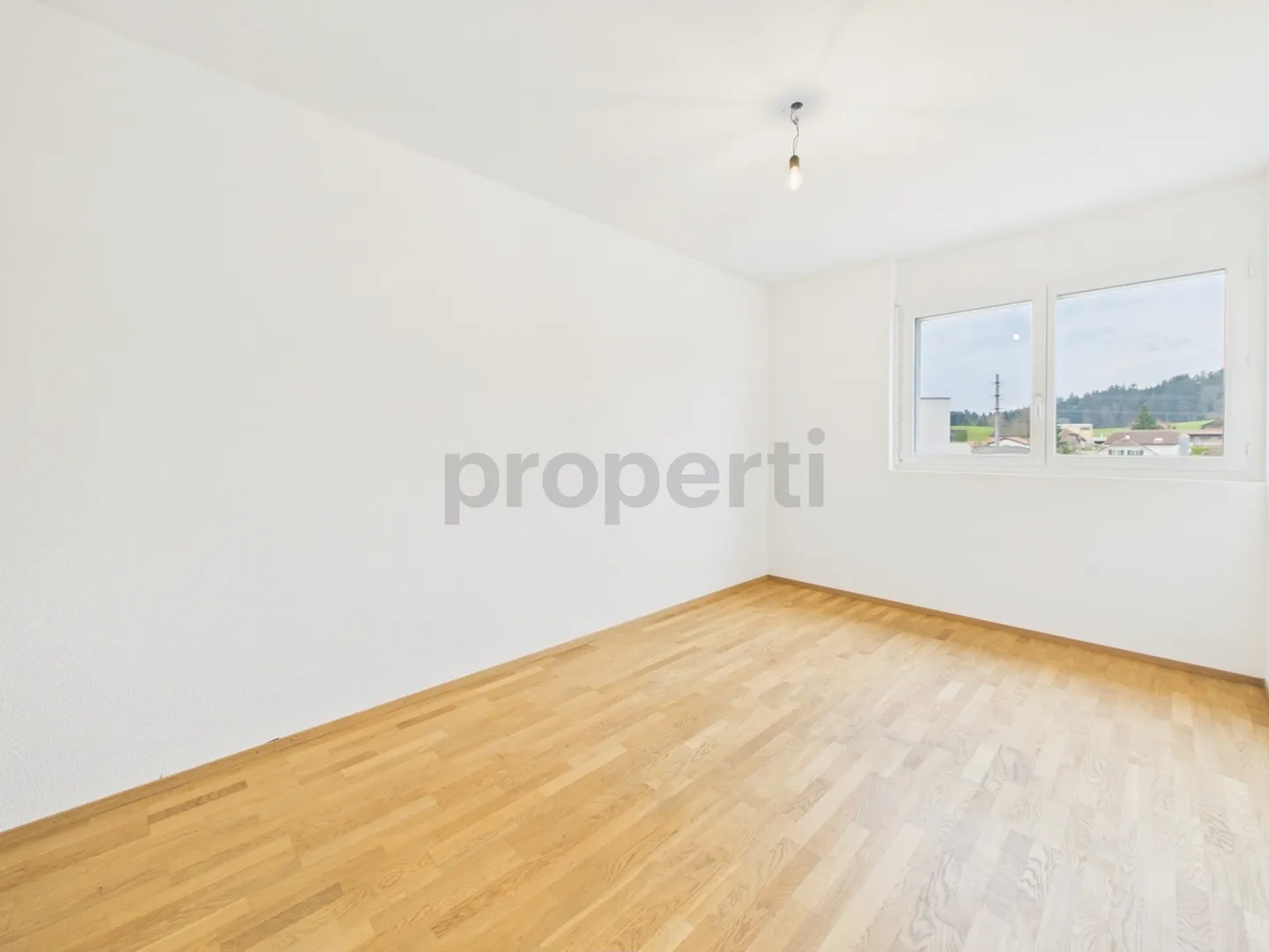 Modern 5.5-room semi-detached house in a quiet location in Schmitten FR - Photo 8 of 13