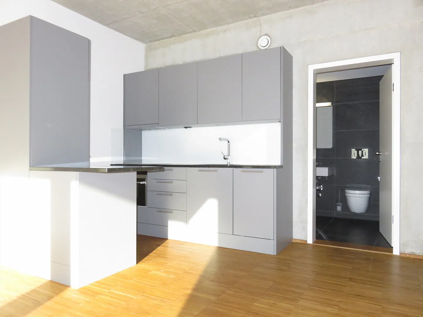 urbanes Wohnen direkt beim Bahnhof Regensdorf - Foto 3 von 8