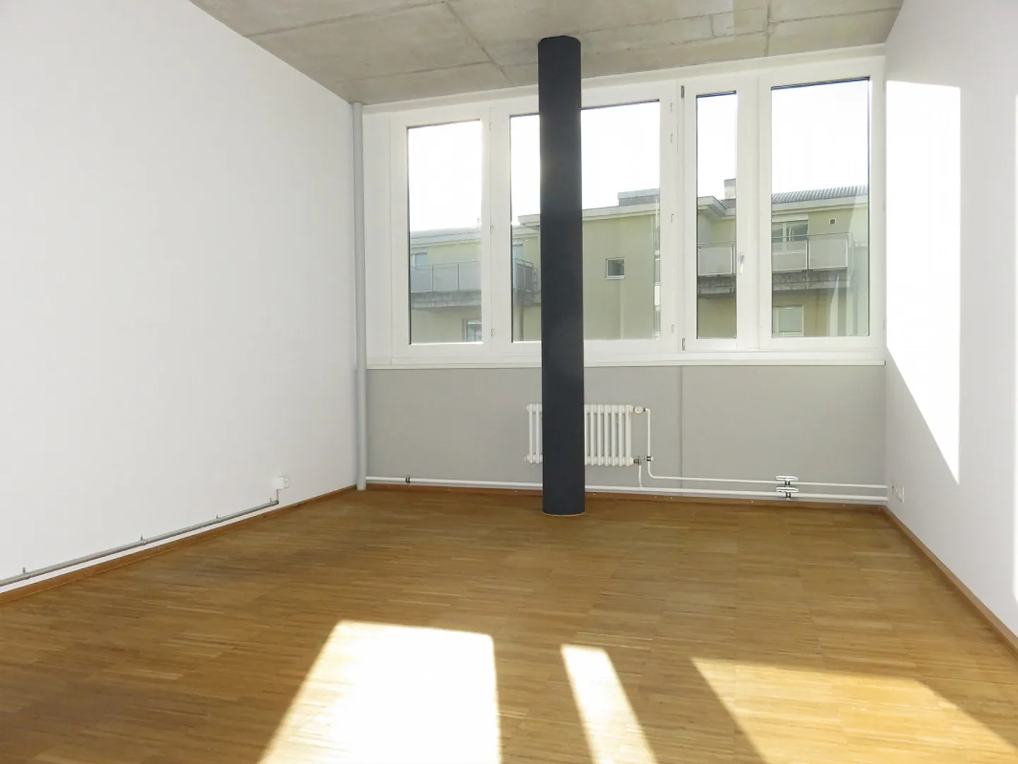 urbanes Wohnen direkt beim Bahnhof Regensdorf - Foto 6 von 8