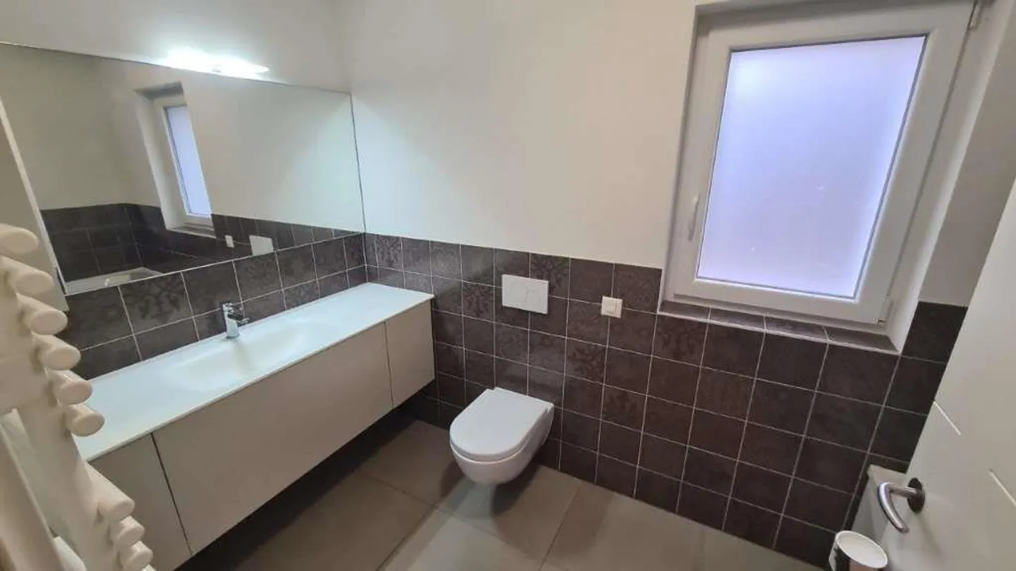 STABIO: LARGE 4.5 ROOM PANORAMIC AND QUIET APARTMENT - Photo 11 of 13