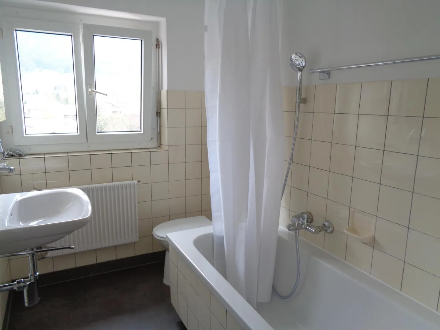 Appartement dans un quartier calme et ensoleillé - Photo 9 sur 12