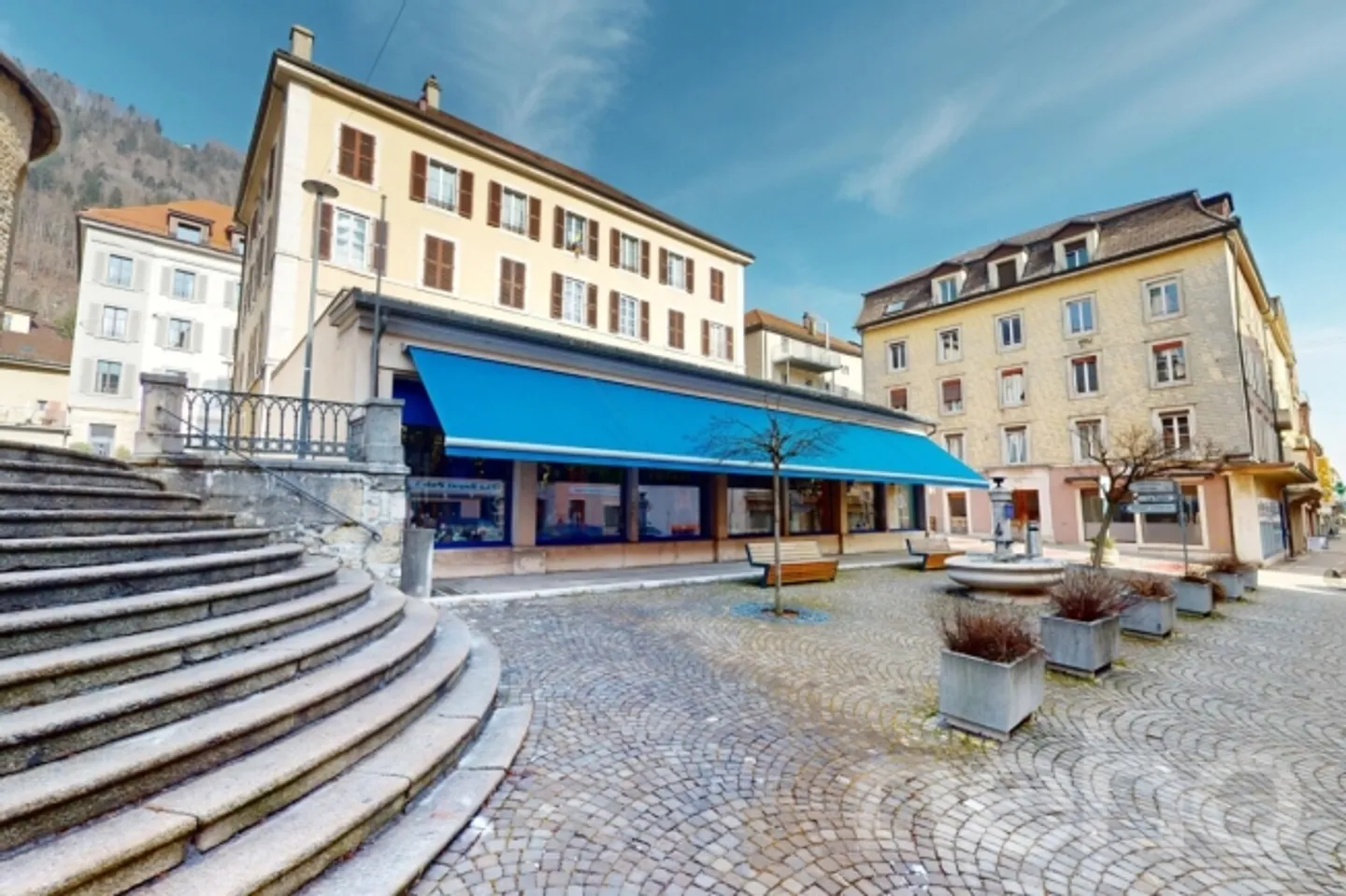 Mixed-use investment property in heart of Saint-Imier - high ROI - Photo 1 of 13