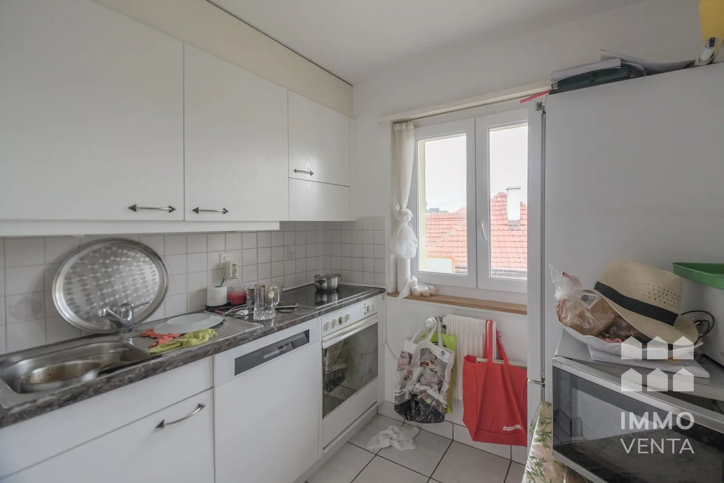 Appartement lumineux de 2½ pièces avec balcon - Photo 3 sur 8