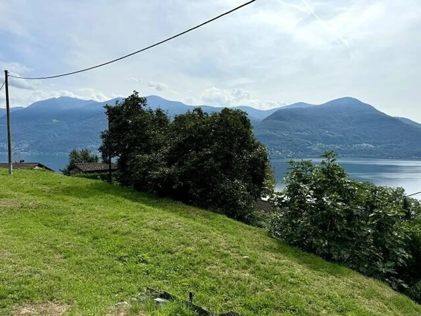 Sonniges Baugrundstück mit Seeblick - Foto 3 von 13