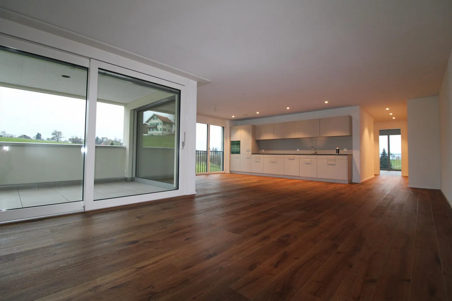 Wohnen im Grünen – stilvolle Neubauwohnung in Samstagern - Foto 1 von 7