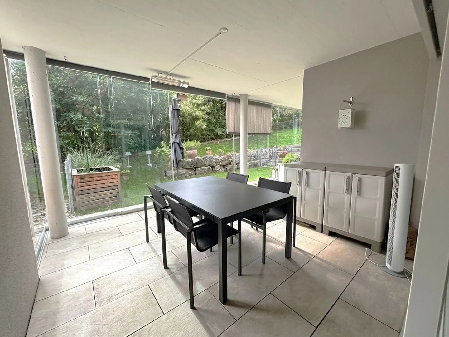 Modernes Gartenapartment mit Wintergarten - Foto 2 von 5