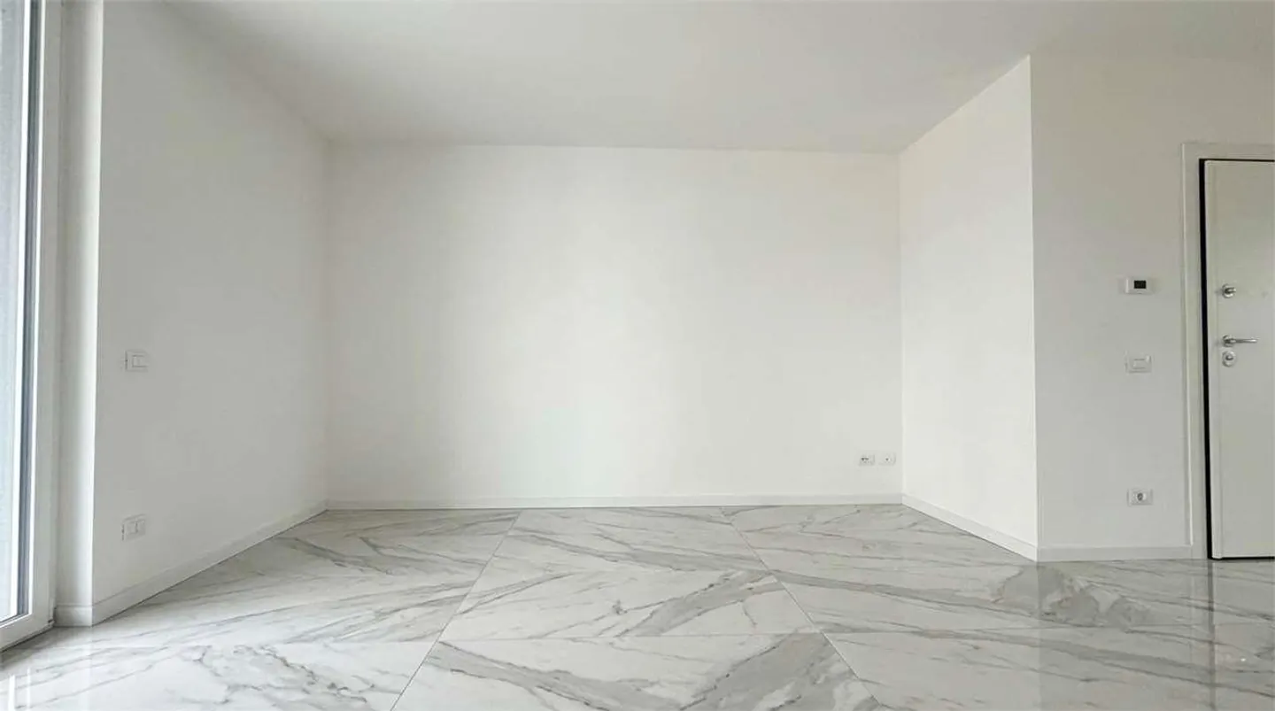 Appartamento moderno con grande terrazzo - Foto 4 di 13