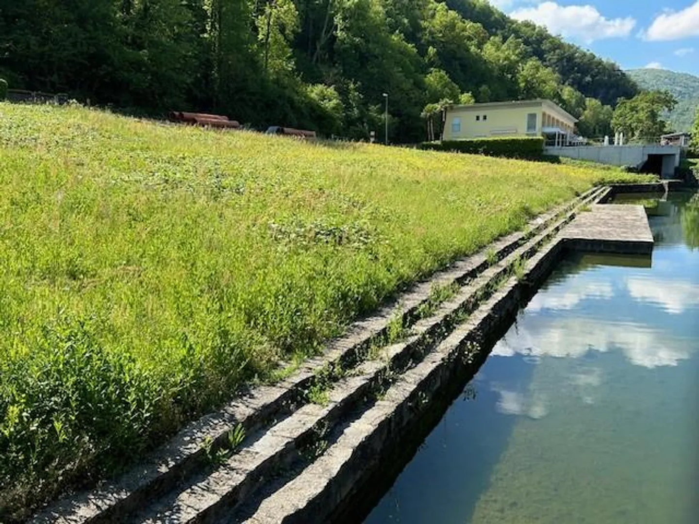 Grundstück mit Seezugang - Foto 1 von 2