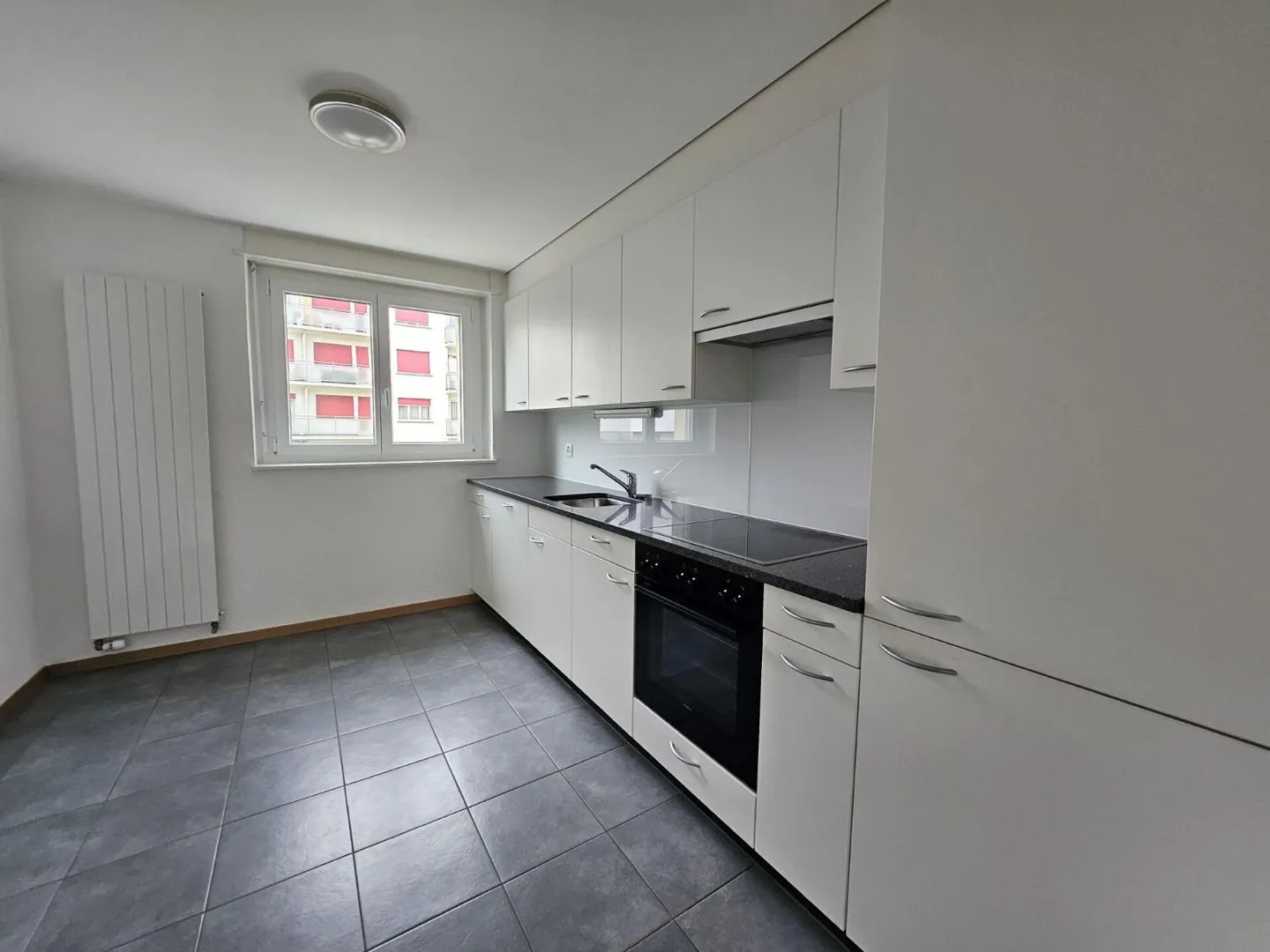 Appartement spacieux de 4,5 pièces au 1er étage - Photo 3 sur 11