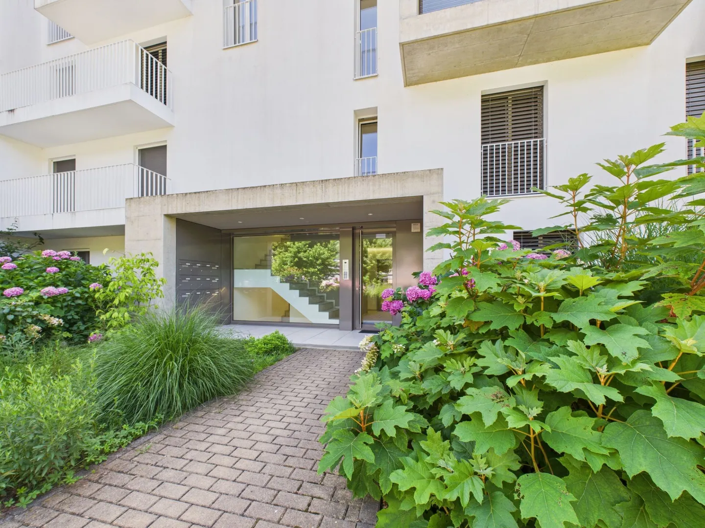 Appartamento moderno di 3,5 locali con giardino privato in complesso residenziale - Foto 22 di 27