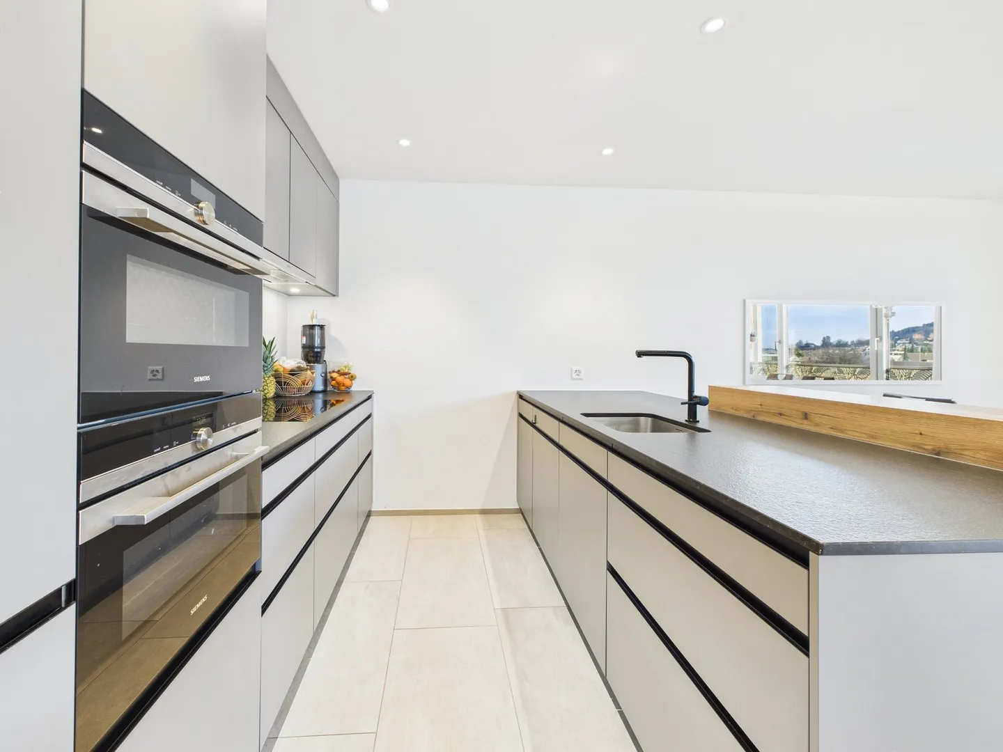 Exklusive Neubauwohnung mit schönem Ausblick - Foto 9 von 21