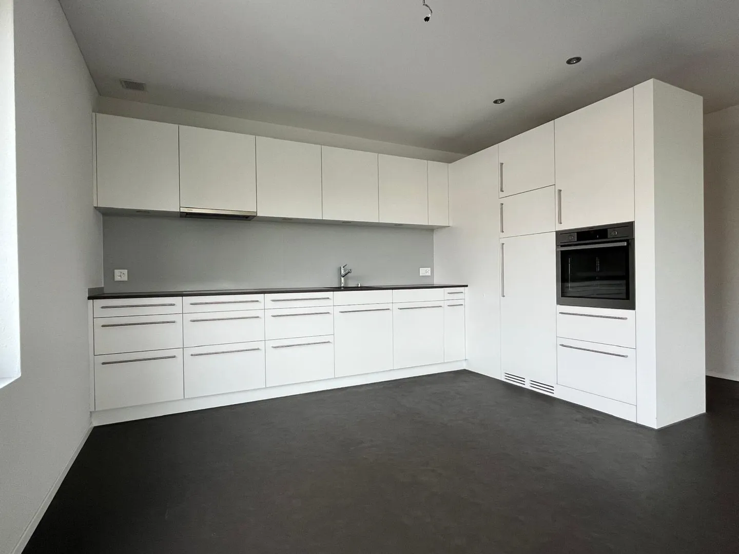 Modern 3.5 room apartment in the city center yet in the green - Photo 1 of 12